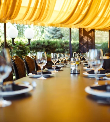 Dining table with dishes & glass